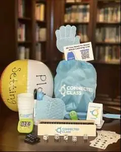 Learning Link Kit of hands-on manipulative including dice, dominos, cards, timer, small beach ball, and more.